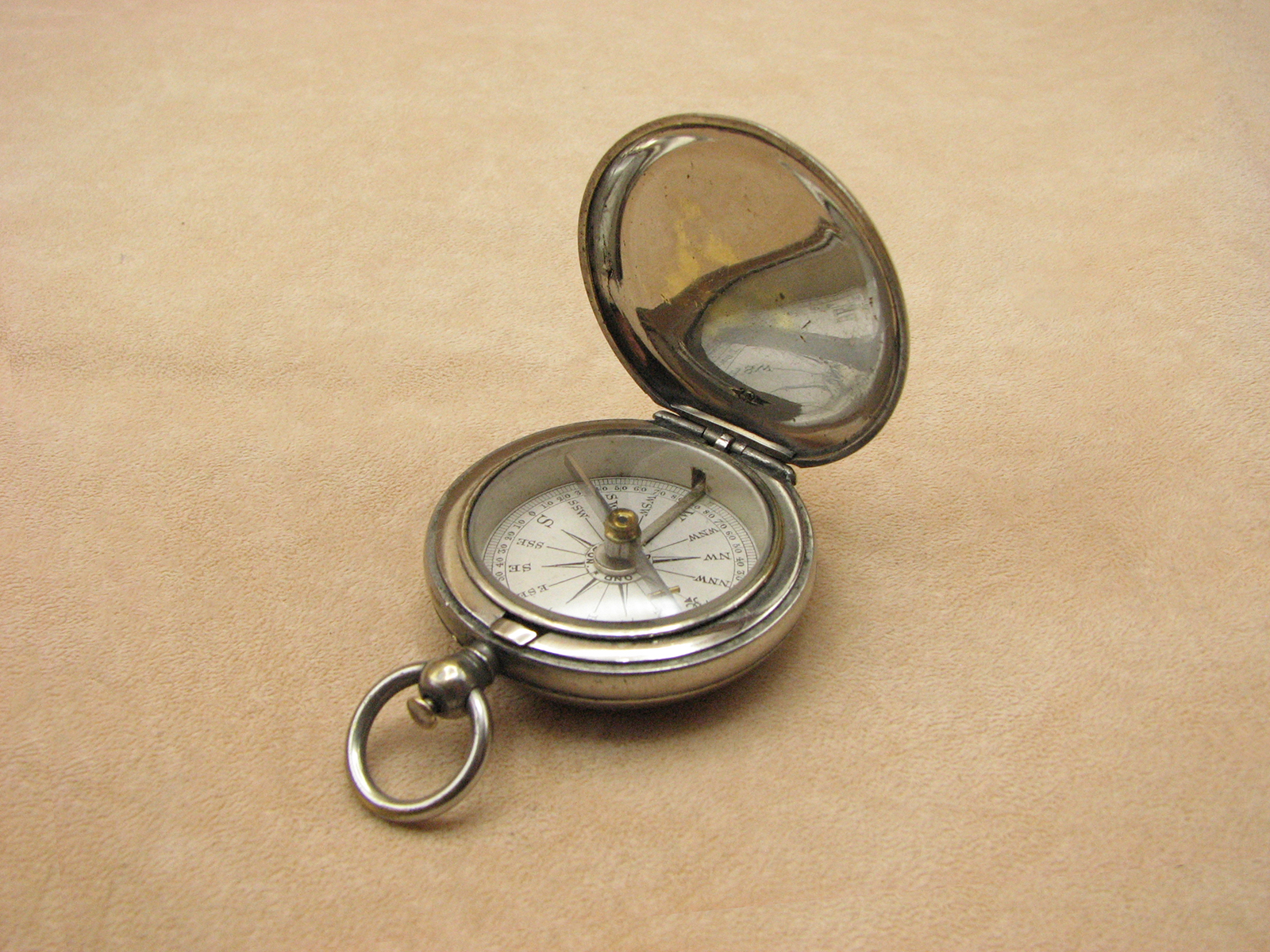 Dollond Victorian hunter cased pocket compass with gemstone needle